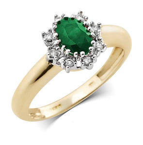 Traditional diamond and oval Emerald cluster Ring